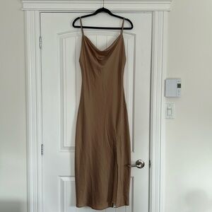Satin look cowl neck taupe dress with slit. Size L. Never worn. Adjustable.